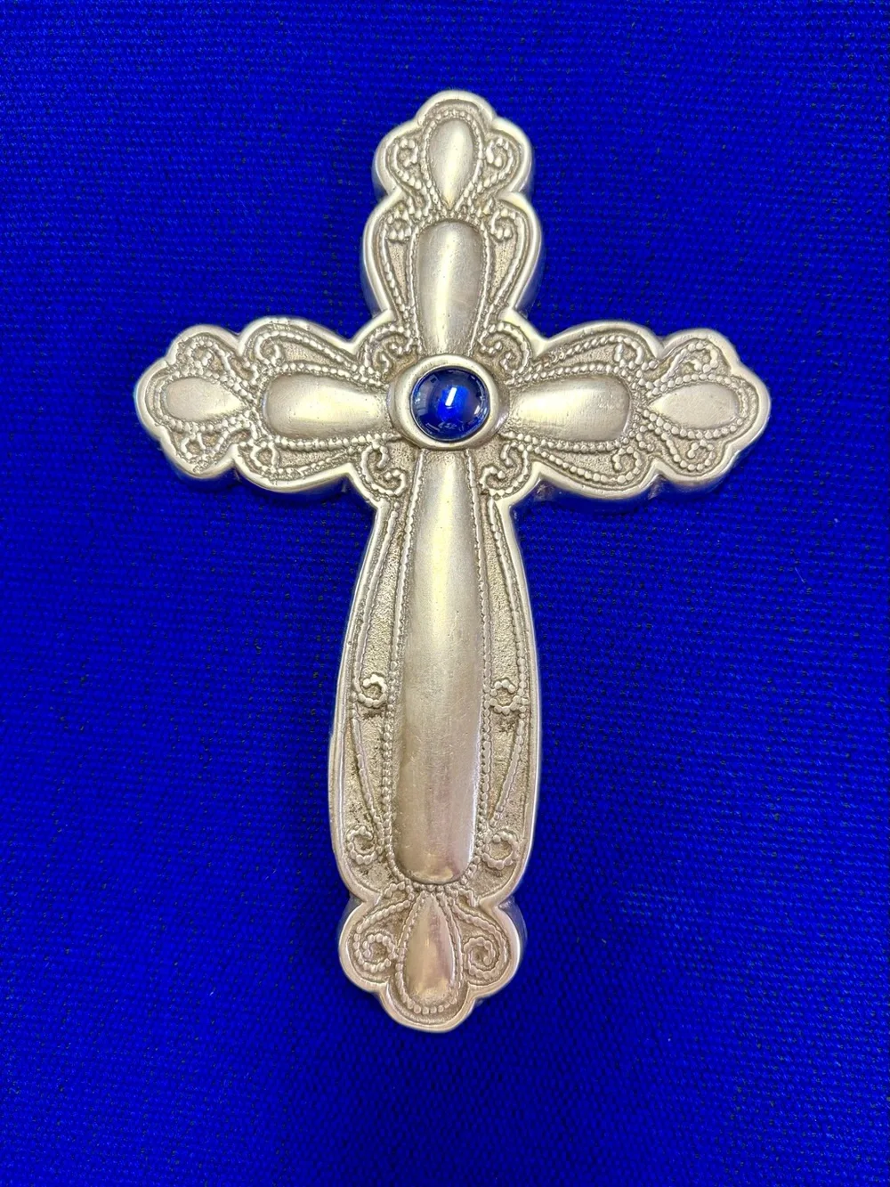 Silver-Colored Metal Cross with Sapphire Blue Centerpiece